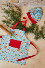 Load image into Gallery viewer, Jolly Kids Christmas Apron &amp; Cap Blue Multi; ETA Early October
